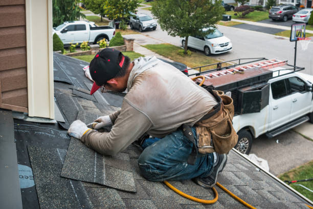 Professional Roofing technician working in Carleton, MI